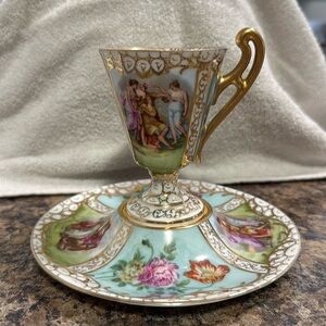 Vintage Austrian Hand- painted teacup & saucer. Fine China.